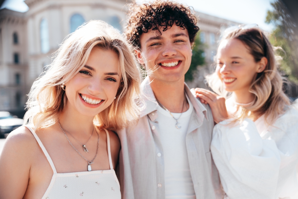 Man and two girls outdoors